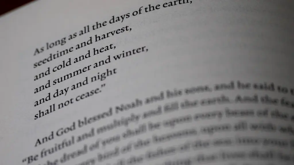 Close-up of a page from an open book featuring printed text.