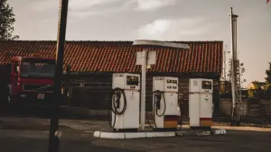 Vintage petrol pumps in front of Teale's Garage in Leeds, United Kingdom.